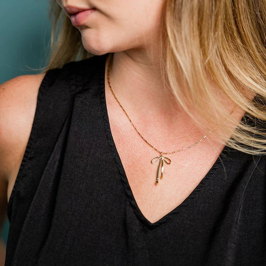 GOLD BOW NECKLACE