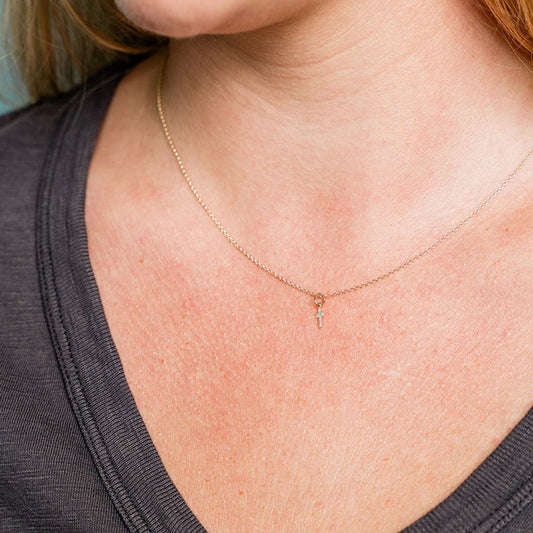 GOLD TINY CROSS NECKLACE